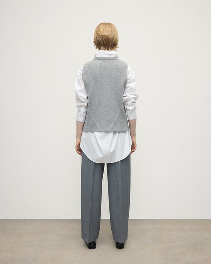 Model wearing Johnstons of Elgin AW25 Women's Knitwear Light Grey Sleeveless Grey Cashmere Tank Top back KBI01037HA0308