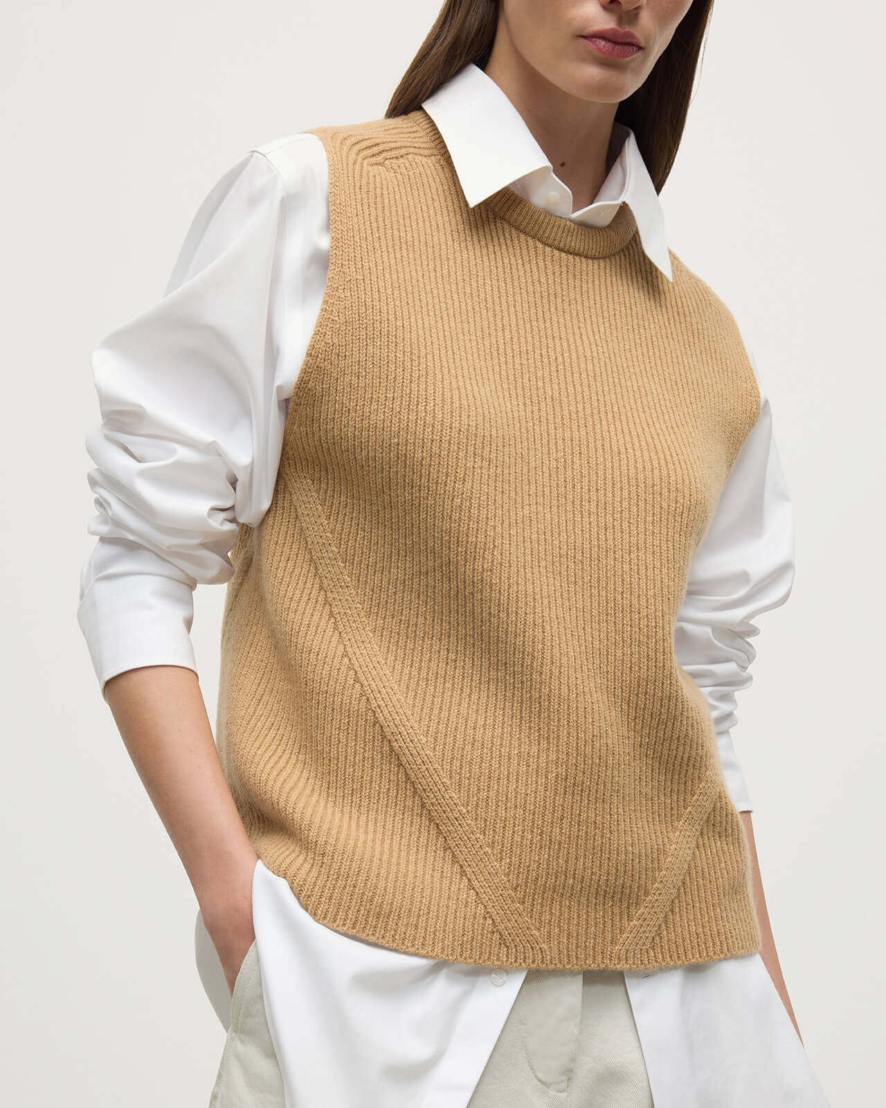 model wearing Johnstons of Elgin AW25 Women's Knitwear Camel Sleeveless Camel Cashmere Tank Top details KBI01037HB4404