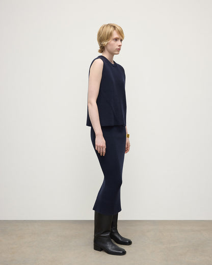 Model wearing Johnstons of Elgin AW25 Women's Knitwear Dark Navy Sleeveless Navy Cashmere Tank Top Side KBI01037SD7666