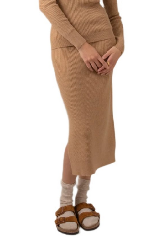 Johnstons of Elgin Ribbed Tube Cashmere Skirt in Camel worn with matching Slim Fit Cashmere Sweater on a grey background KBP00923HB4315