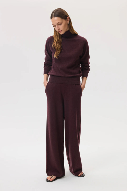 Johnstons of Elgin SS25 Women's Knitwear Rosewood High Rise Cashmere Culottes with matching cashmere roll neck sweater and black sandals KBP00926SB7089