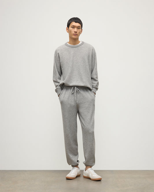 MALE MODEL WEARS JOHNSTONS OF ELGIN MENS KIRK SWEATPANTS LIGHT GREY 97% CASHMERE 3% POLYESTER WITH LIDDEL CASHMERE SWEATSHIRT KBP00948HA0308