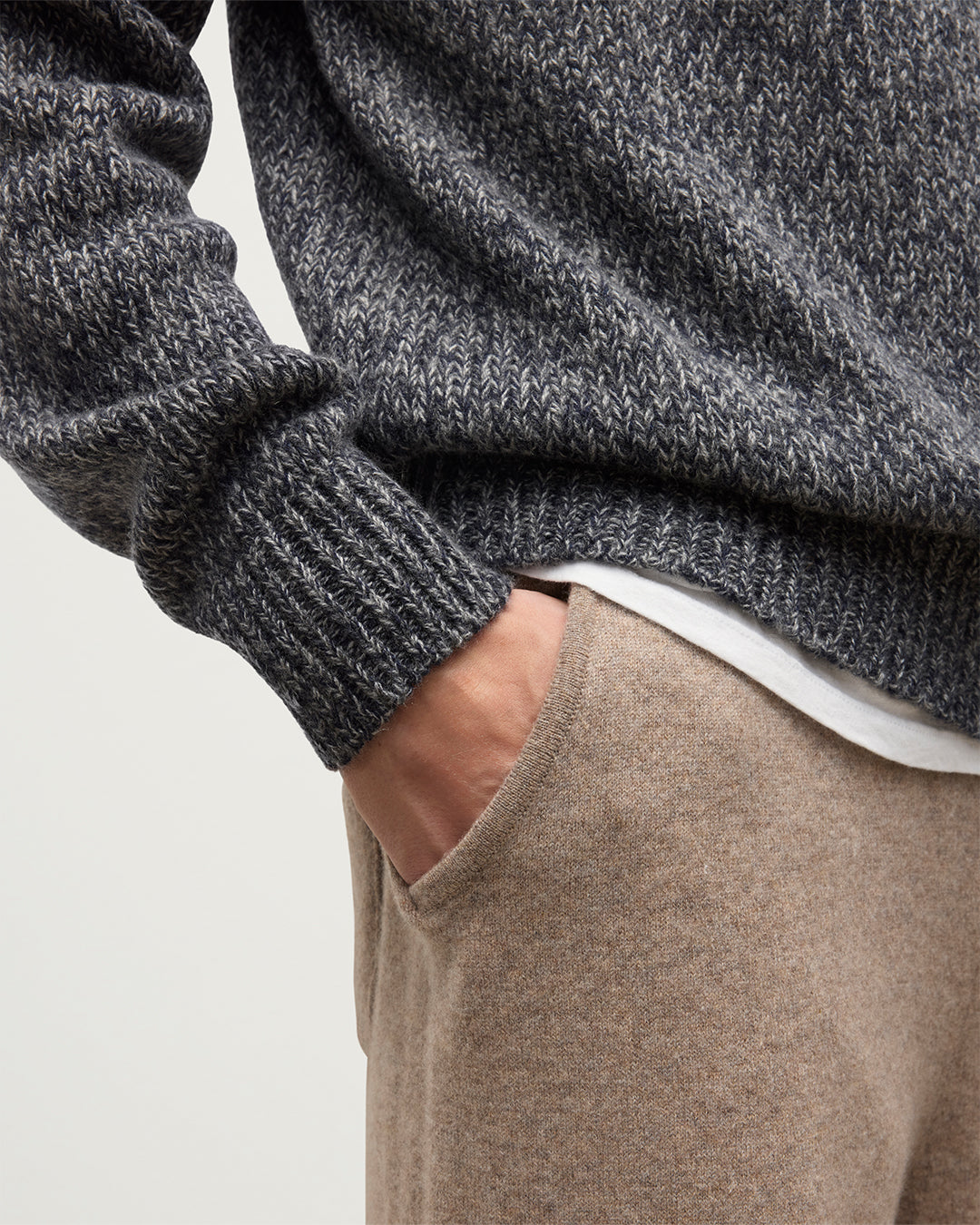 MODEL WEARS JOHNSTONS OF ELGIN MENS KIRK SWEATPANTS LIGHT BROWN 97% CASHMERE 3% POLYESTER WITH AND NAVY FYFE CASHMERE SWEATER KBP00948HB4334