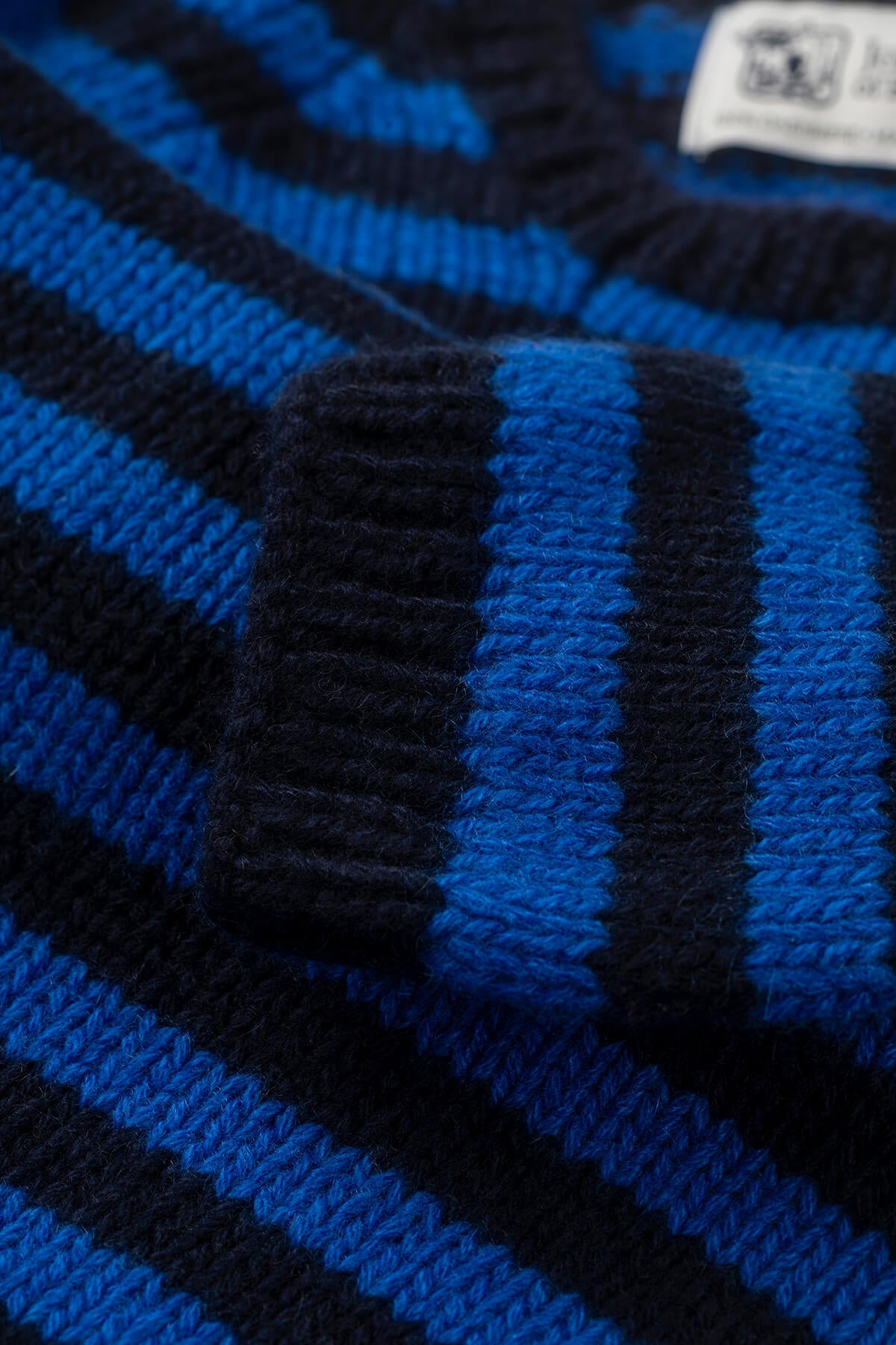 Details on a Johnstons of Elgin Stripy Hand Knitted Children's Cashmere Jumper in Navy & Bright Blue 76199ZZZ107