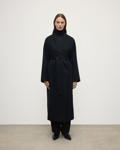 Model wears Johnstons of Elgin AW25 Women's Tailoring Black Black Cashmere Wrap Coat Front View TA000621RU6432