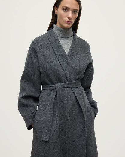 Model wears Johnstons of Elgin AW25 Women's Tailoring Mid Grey Grey Cashmere Wrap Coat close up TA000621RU7292