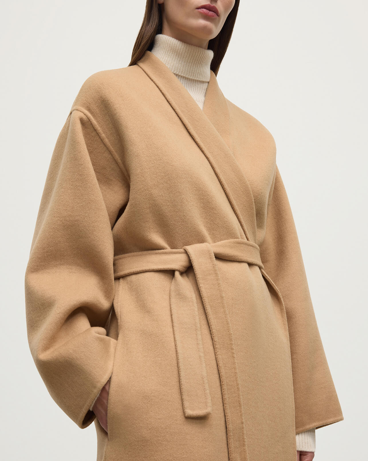 Model wears Johnstons of Elgin AW25 Women's Tailoring Camel Camel Cashmere Wrap Coat details TA000621RU7397