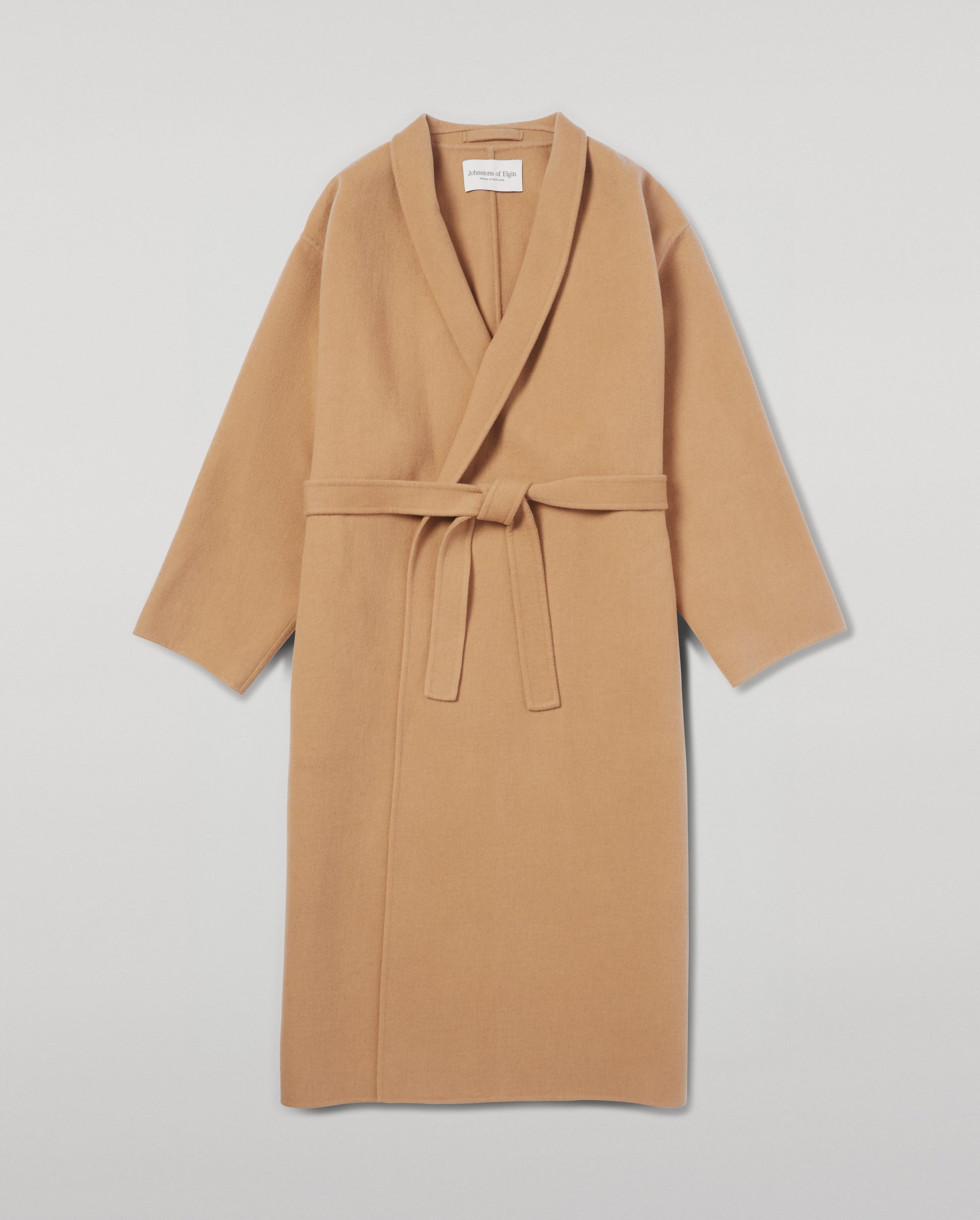 Model wears Johnstons of Elgin Women's Tailoring Camel Camel Cashmere Wrap Coat Front View  TA000621RU7397