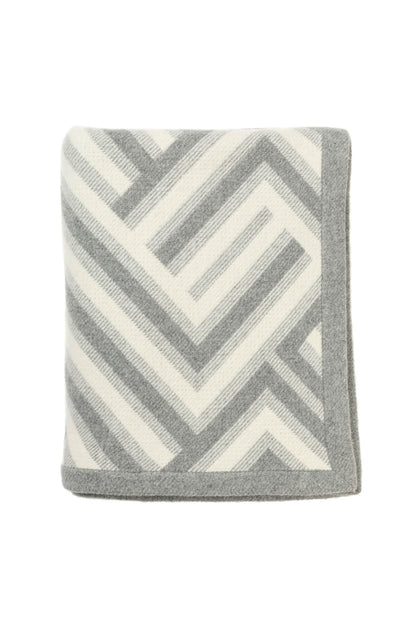 Johnstons of Elgin Merino Cashmere Blend Chevron Throw in Grey & White folded on a white background TB000470RU6996ONE