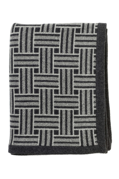 Johnstons of Elgin Merino Cashmere Blend Chevron Throw in Grey & Charcoal folded on a white background TB000470RU6998ONE