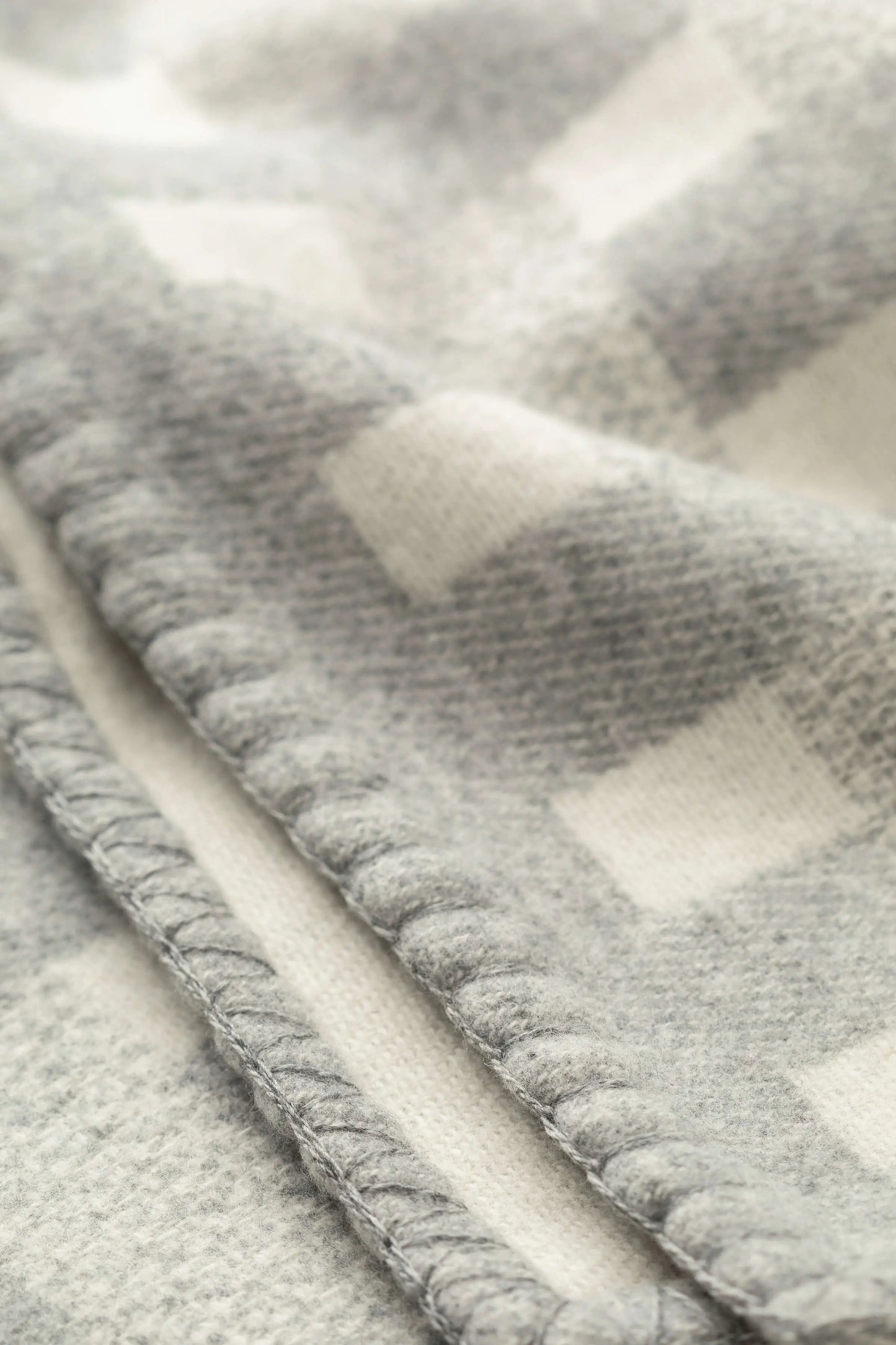 2025 Johnstons of Elgin Interiors Collection Light Grey & White Blanket Stitched Basketweave Throw  TB000500RU7442ONE