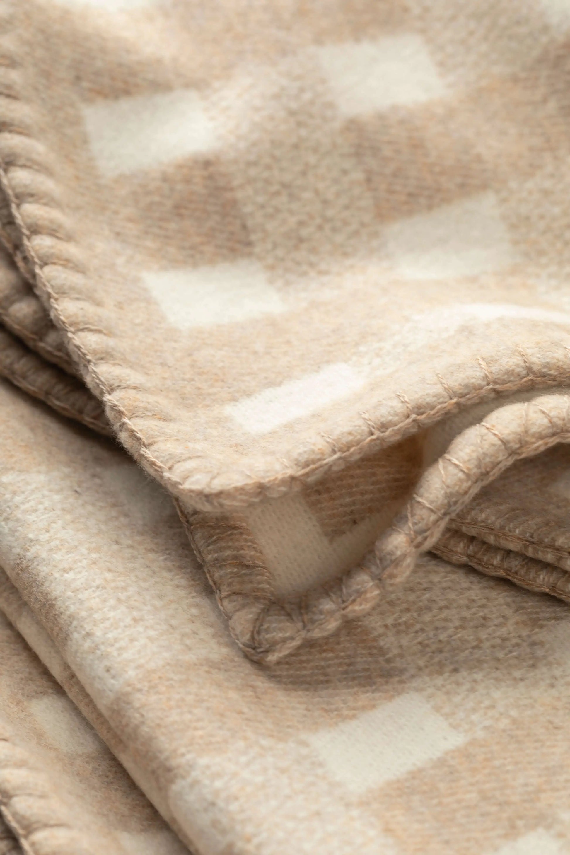 2025 Johnstons of Elgin Interiors Collection Oatmeal & White Blanket Stitched Basketweave Throw close up   TB000500RU7443ONE