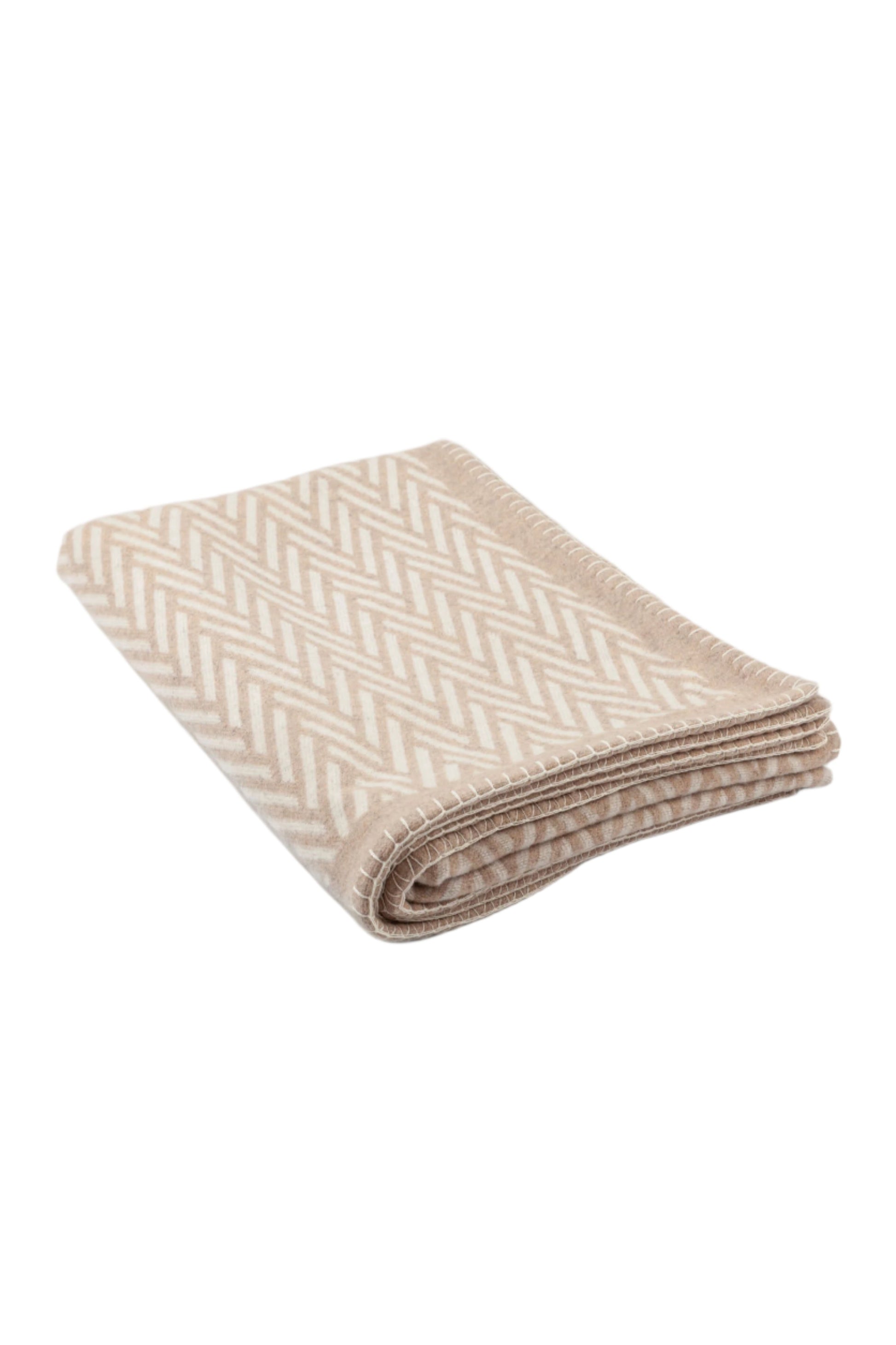 Johnstons of Elgin Merino Cashmere Blend Chevron Throw in Natural & White folded on a white background TB000500RU6971ONE