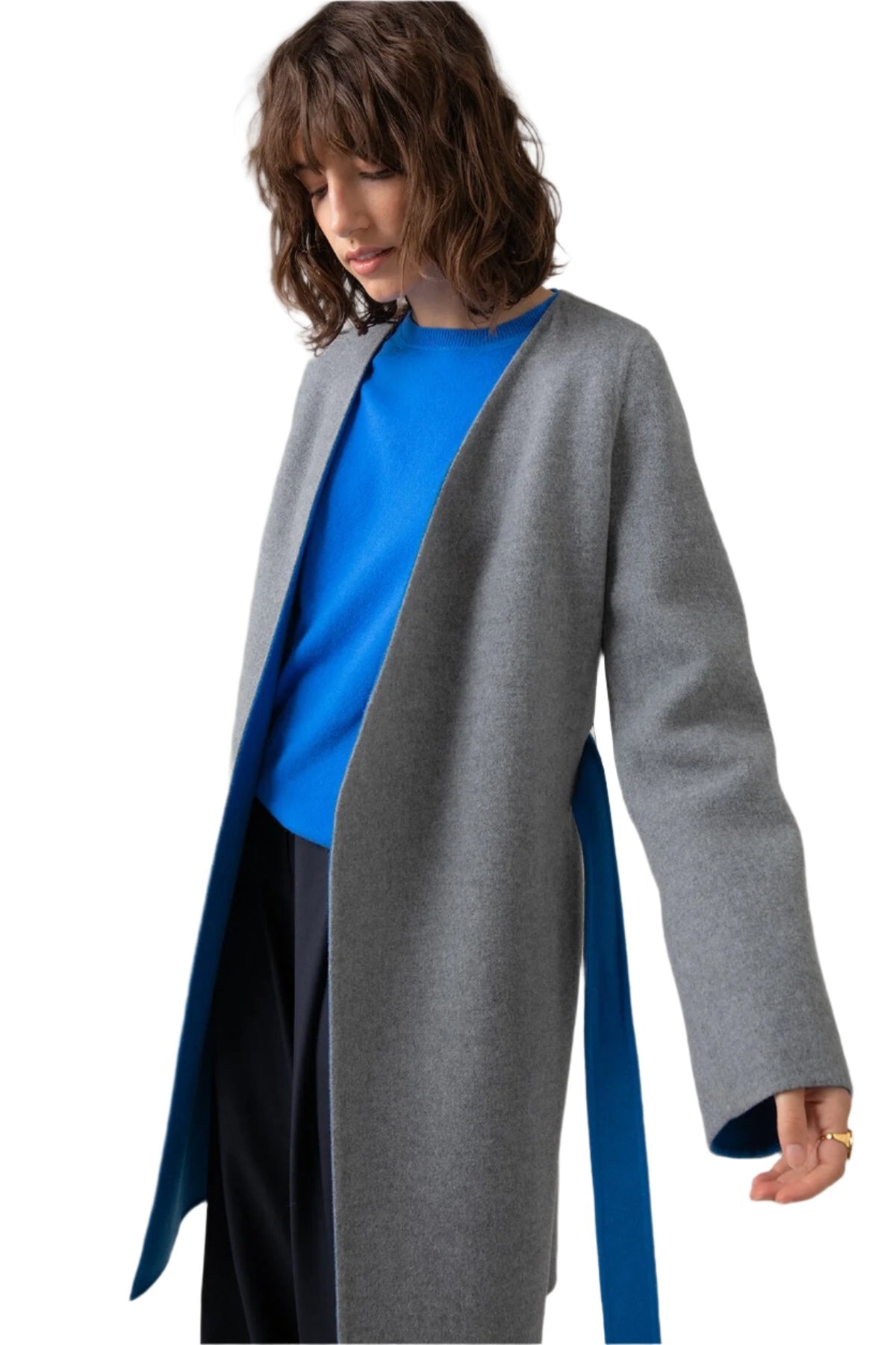 Johnstons of Elgin Women's Collarless Cape Wool Blend Coat in Mid Grey & Blue on a grey background TB000633RU7381