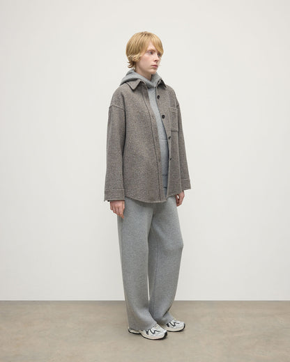 Model wearing Johnstons of Elgin AW25 Women's Tailoring Ash Small Glen Urquhart Glen Urquhart Check Oversized Shirt Side View TB000754RU7675