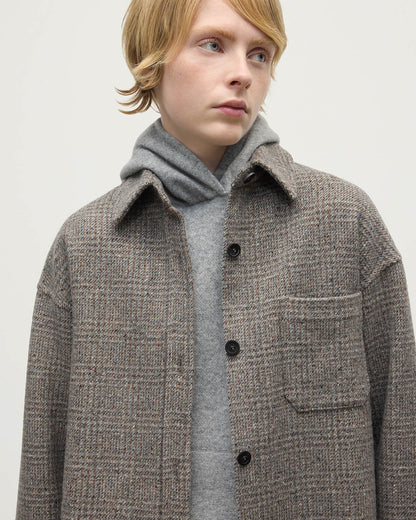 Model wearing Johnstons of Elgin AW25 Women's Tailoring Ash Small Glen Urquhart Glen Urquhart Check Oversized Shirt Close Up TB000754RU7675