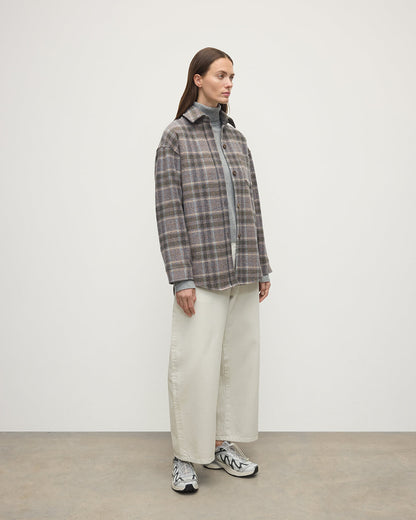 Model wears Johnstons of Elgin AW25 Women's Tailoring Slate Tweed Check Slate Tweed Check Oversized Shirt Side View TB000754RU7676