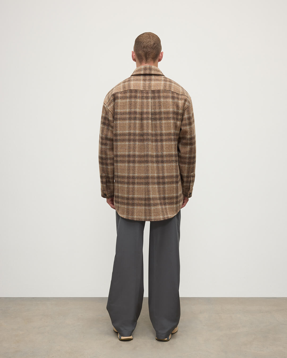 Back shot of Model wears Johnstons of Elgin AW25 Men's Tailoring Vicuna Tweed Check Cashmere Wool Blend Brown Overshirt TB000755RU7683