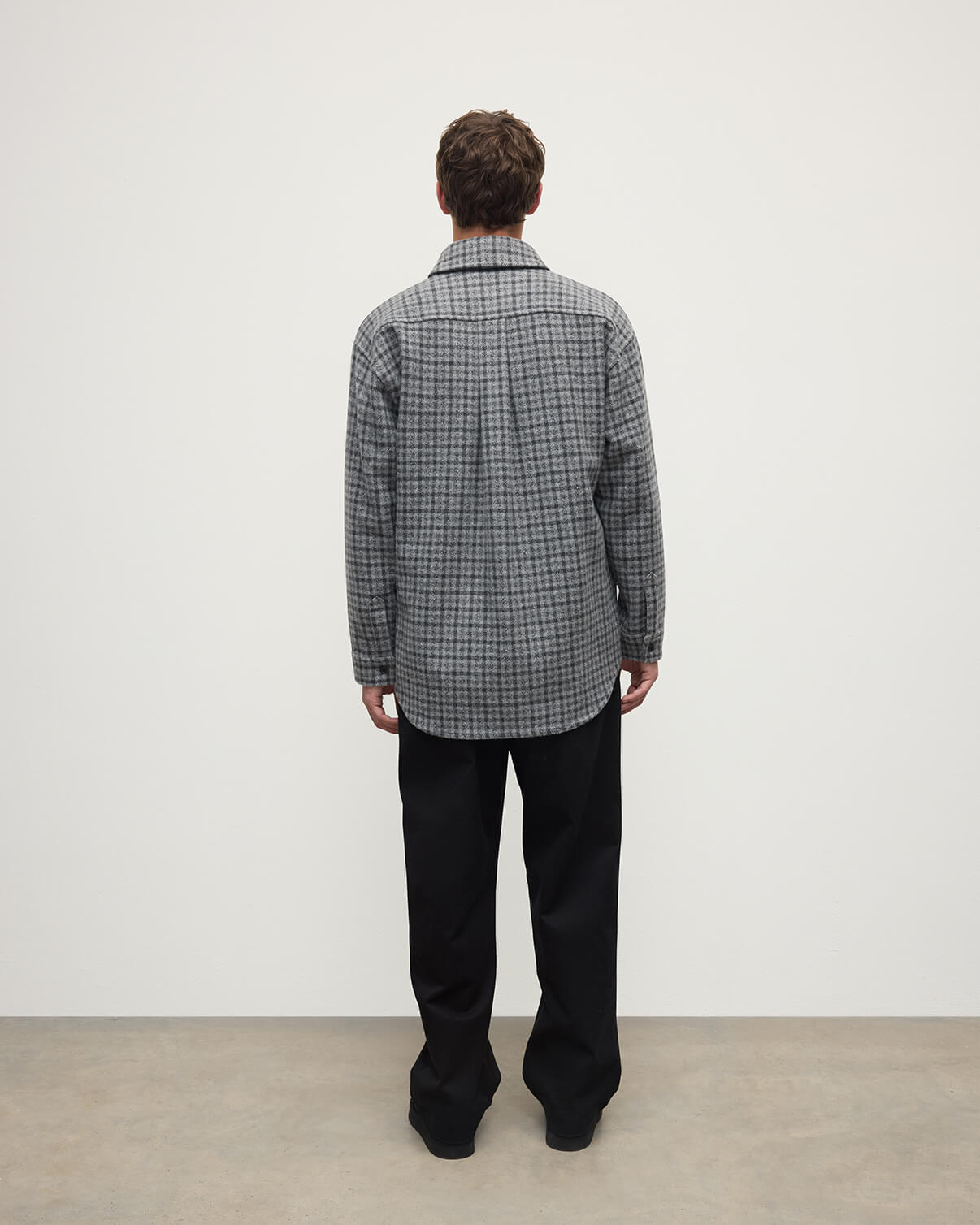 Back view of a model wearing Johnstons of Elgin AW25 Men's Tailoring Grey Classic Gunclub Cashmere Wool Blend Grey Overshirt TB000755RU7684