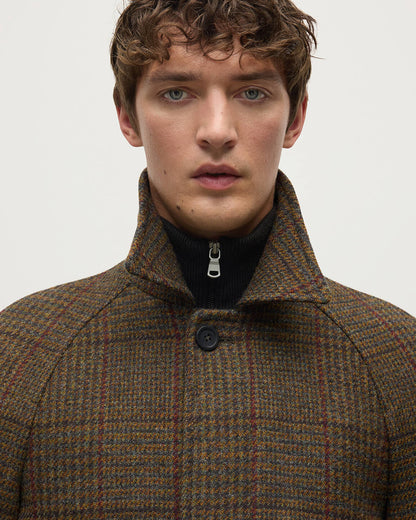 Model wearing Johnstons of Elgin AW25 Men's Tailoring Moorland Glen Urquhart Check The Balmacaan' Coat | Moorland Glen Urquhart Check details View TD000475RU7677