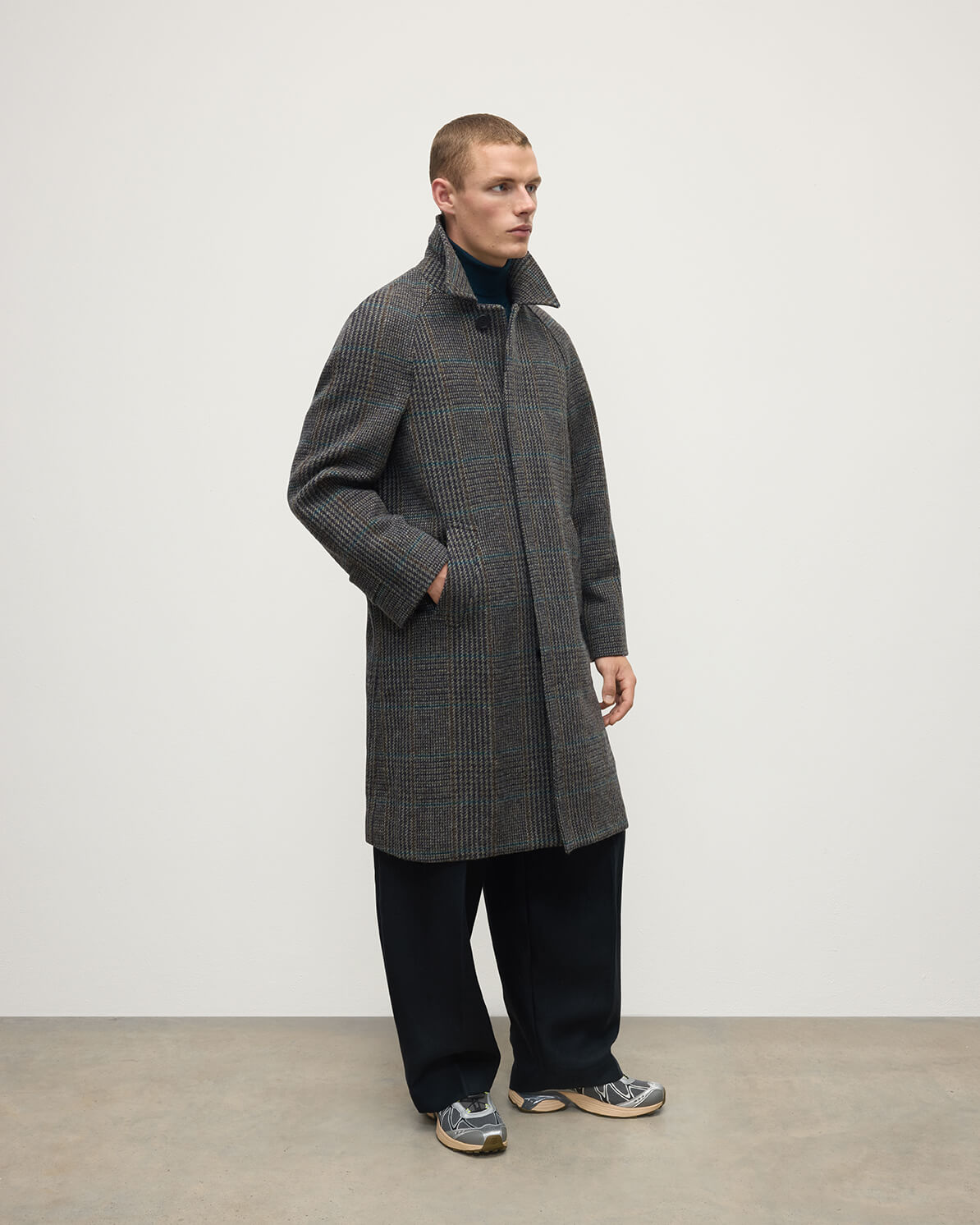 Side view of Johnstons of Elgin AW25 Men's Tailoring Dark Slate Glen Urquhart The Balmacaan' Coat | Dark Slate Check TD000475RU7678