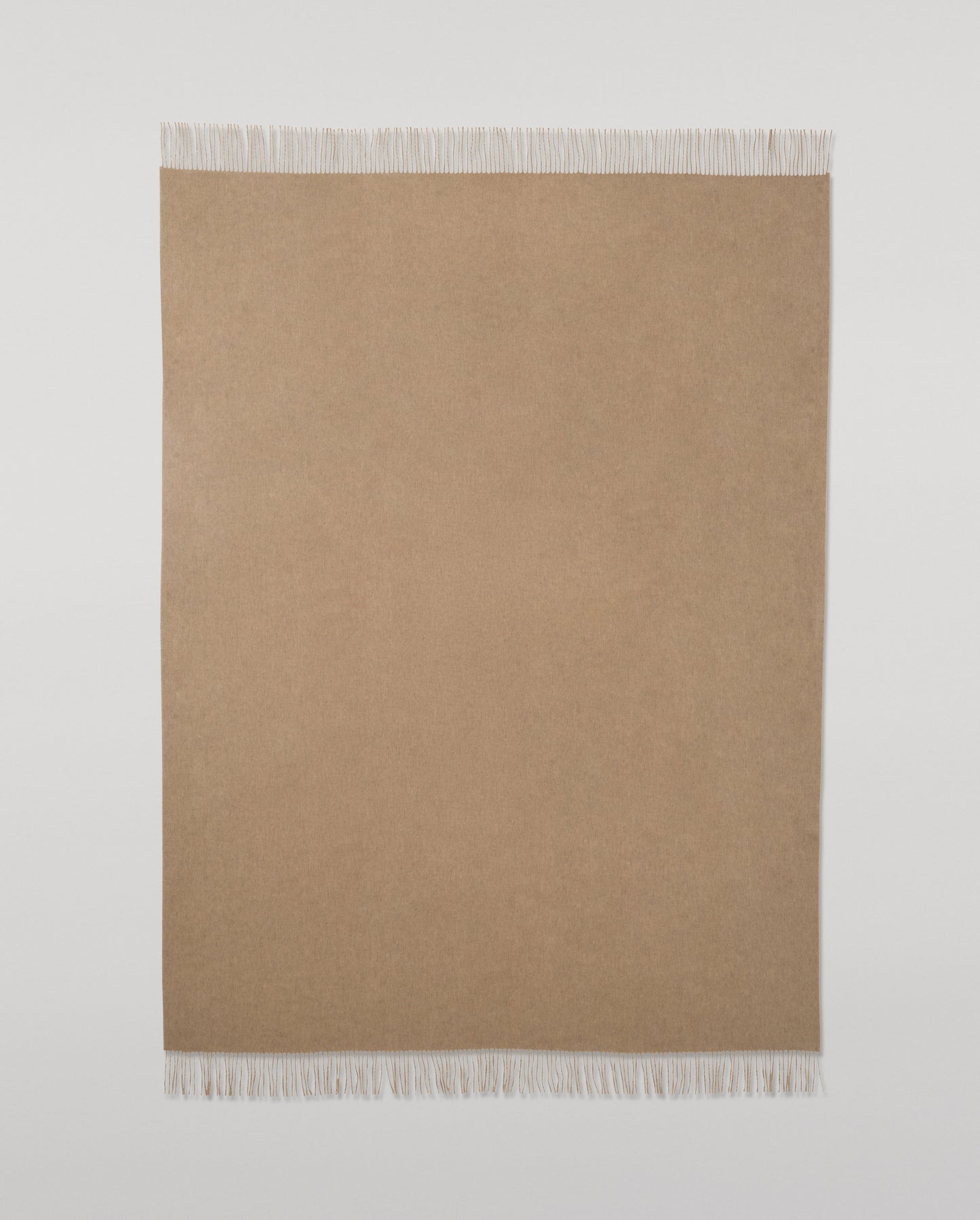 Johnstons of Elgin Interiors Collection Otter & Oatmeal Reversible Cashmere Throw on a grey background  WA000013RU7622ONE