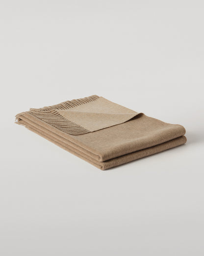 Johnstons of Elgin Interiors Collection Otter & Oatmeal Reversible Cashmere Throw on a grey background  WA000013RU7622ONE