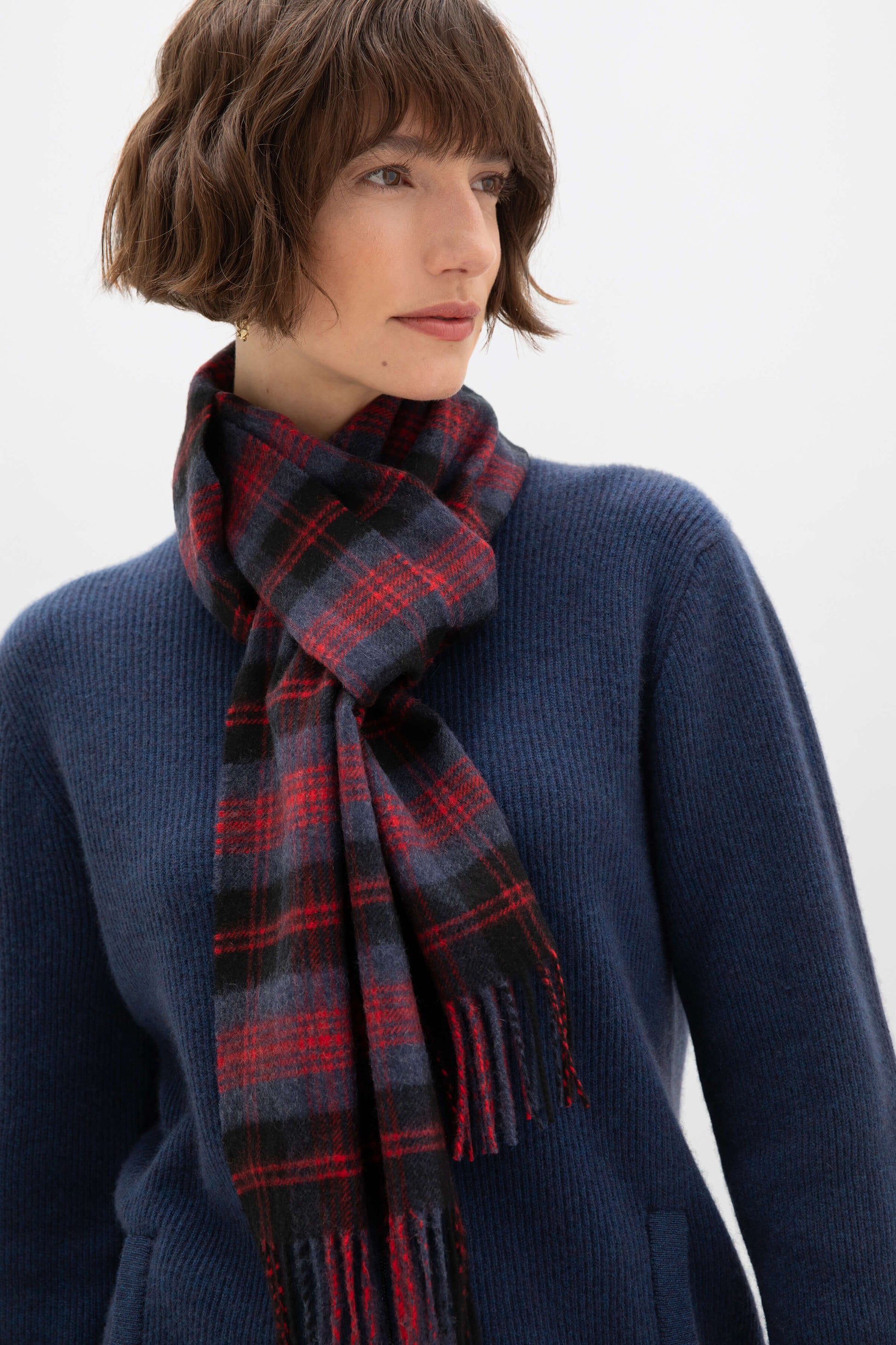 Johnstons of Elgin Tartan Cashmere Scarf in Angus on a model WA000016KU0125ONE