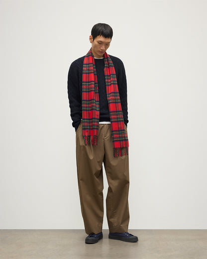 Male model wearing Johnstons of Elgin Tartan Cashmere Scarf in Royal Stewart on a white background WA000016KU0303N/A