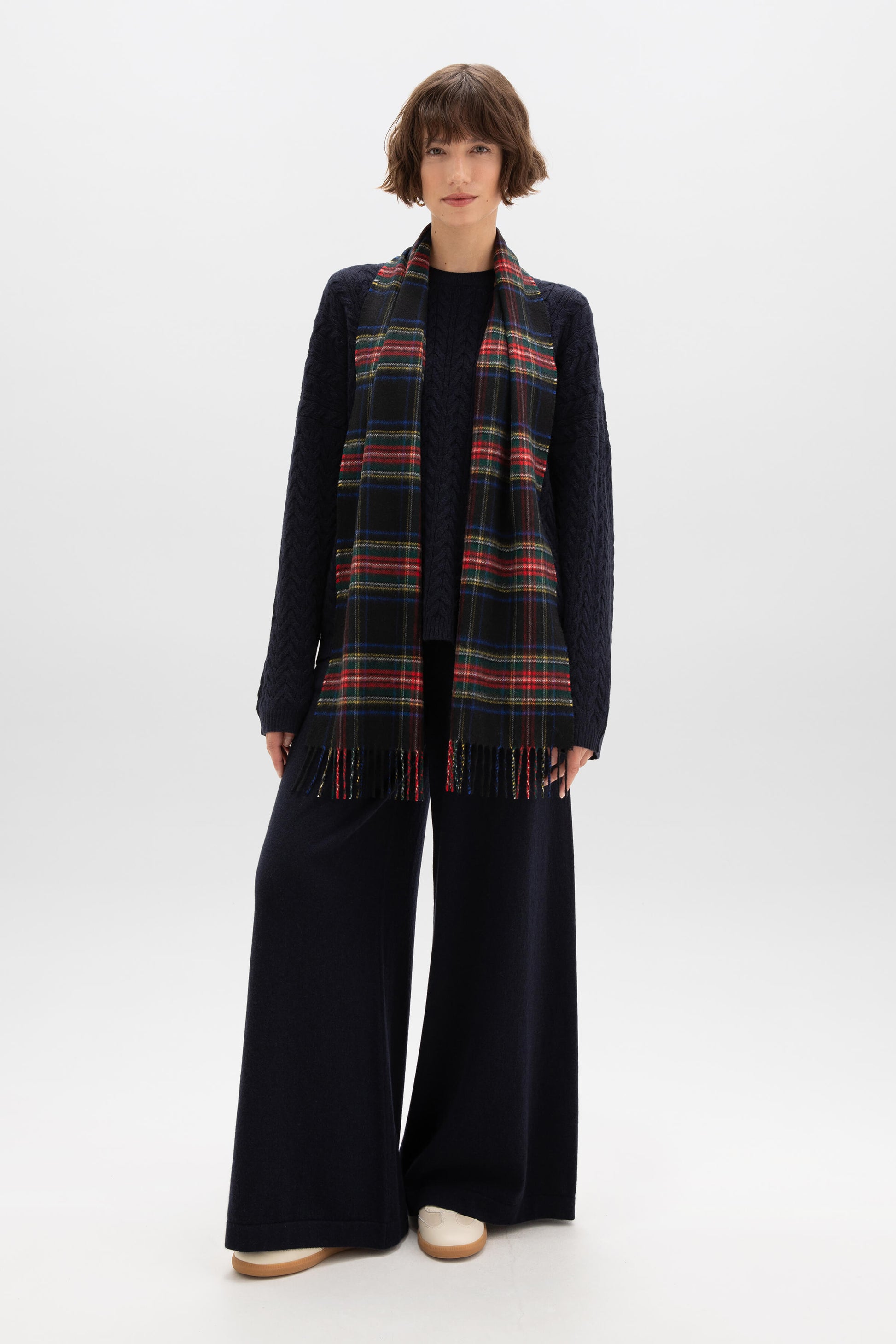 Johnstons of Elgin Tartan Cashmere Scarf in Black Stewart on a female model WA000016KU0324N/A