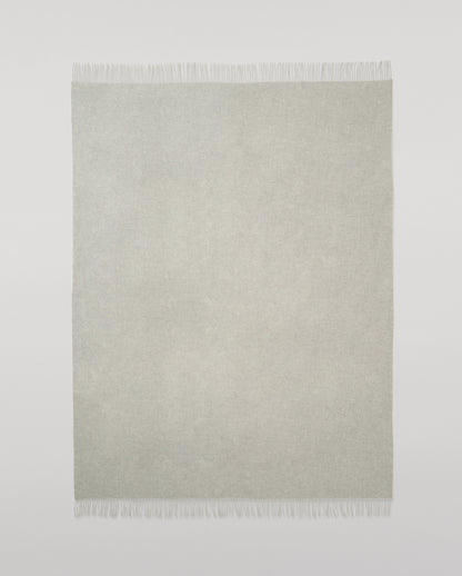 Johnstons of Elgin Interiors Collection  Silver Cashmere Throw on a wooden chair background  WA000055HA0100ONE