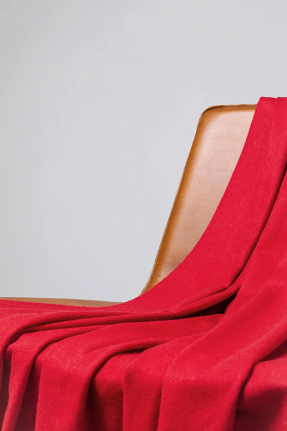 2025 Johnstons of Elgin Interiors Collection Classic Red Cashmere Throw on a brown leather chair WA000055SE0510N/A