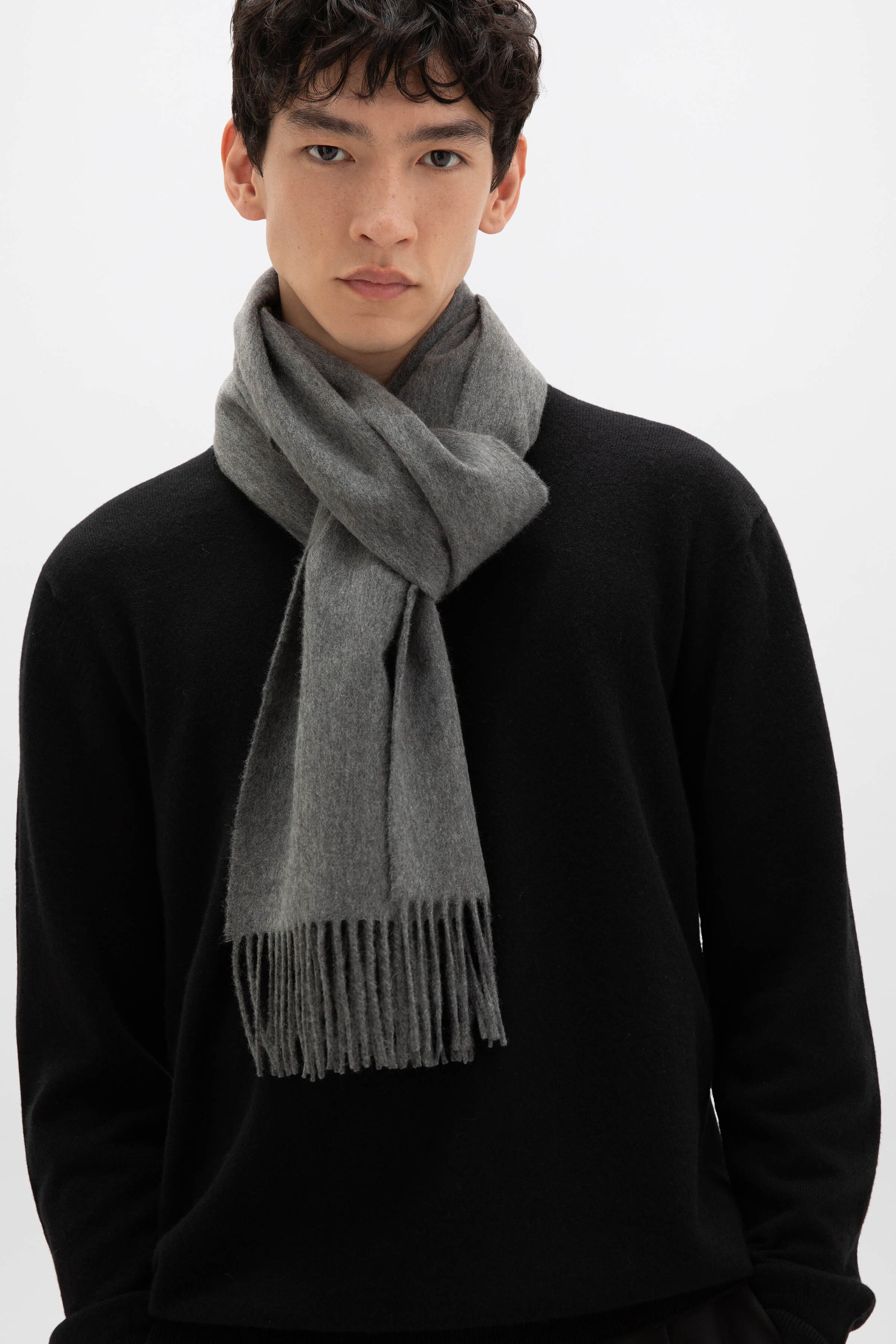 Johnstons of Elgin Oversized Cashmere Scarf in Mid Grey on a model WA000057HA0501ONE