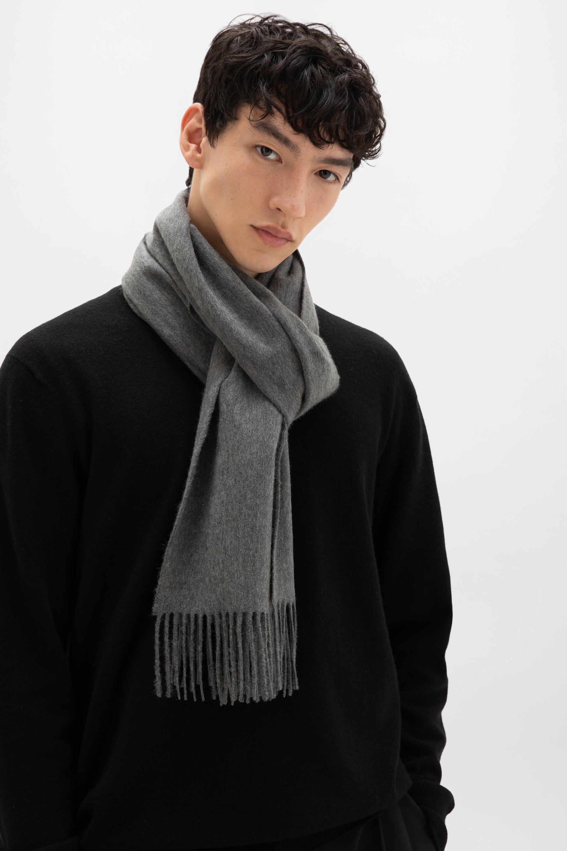 Johnstons of Elgin Oversized Cashmere Scarf in Mid Grey on a model WA000057HA0501ONE