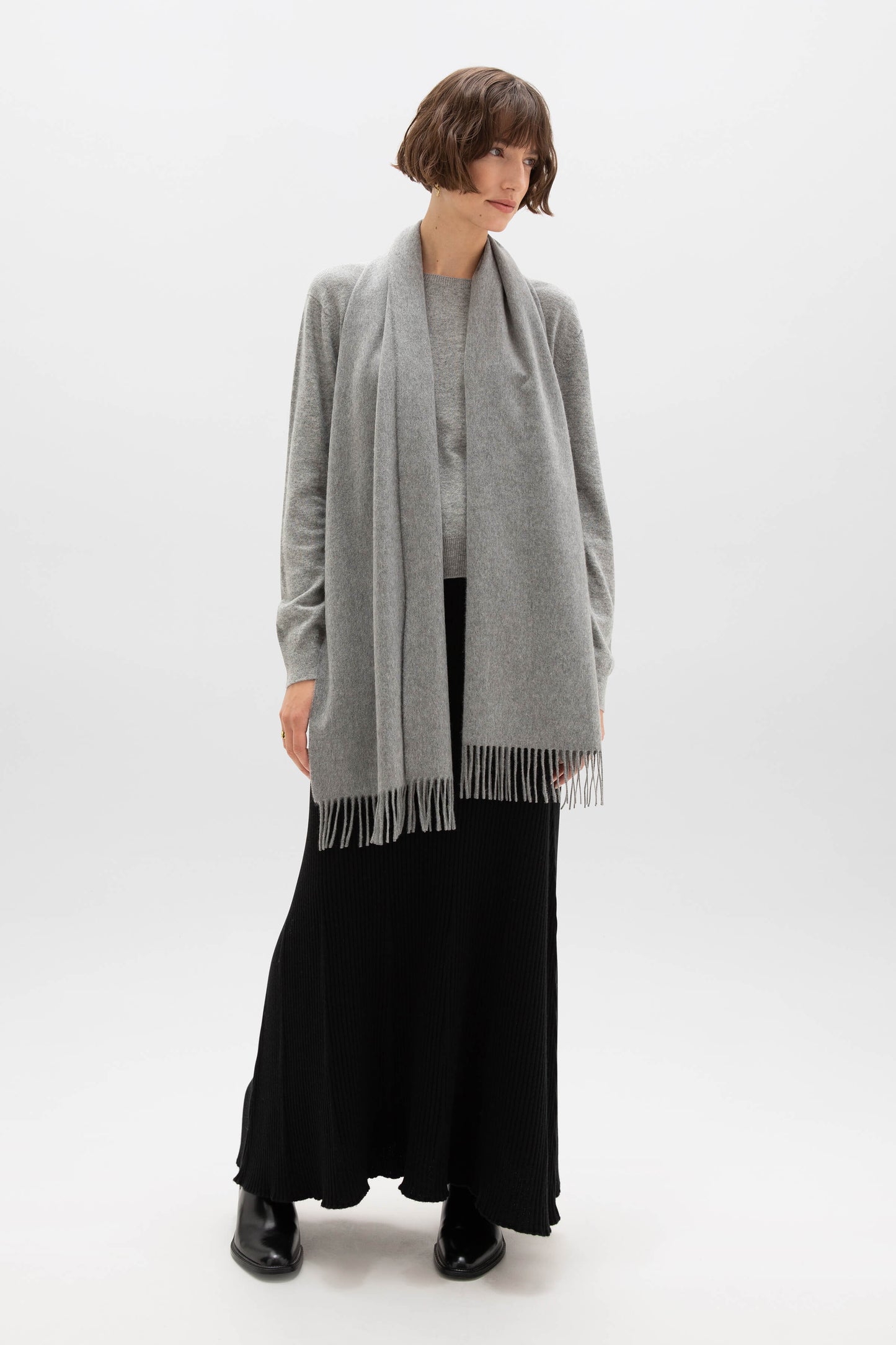 Johnstons of Elgin Oversized Cashmere Scarf in Mid Grey on a model WA000057HA0501ONE