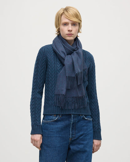 Model wearing Johnstons of Elgin AW25 Woven Accessories Heather Navy Heather Navy Wide Cashmere Scarf WA000057HD7311ONE