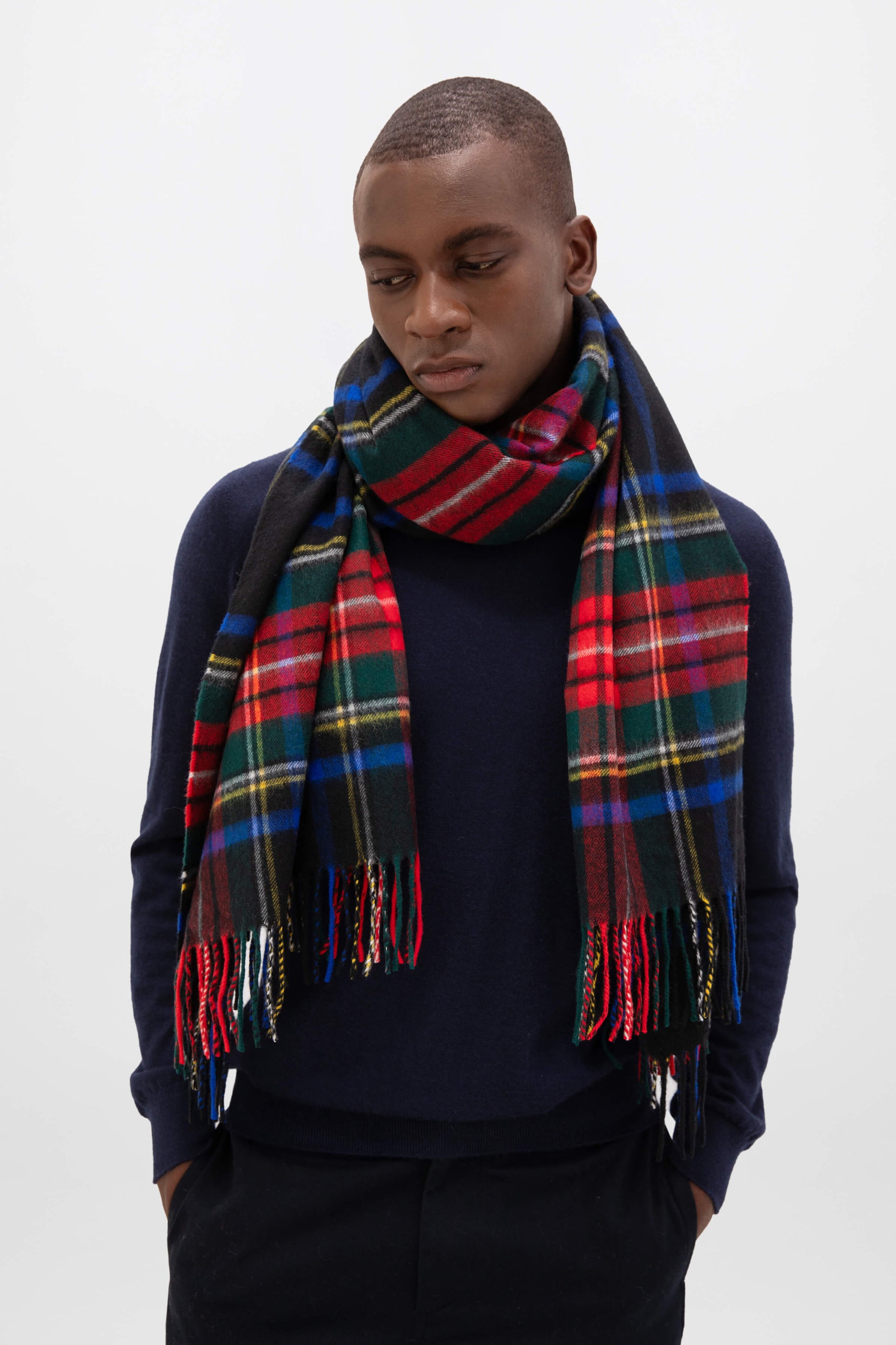 Johnstons of Elgin Tartan Cashmere Stole in Black Stewart on a male model WA000056KU0324N/A