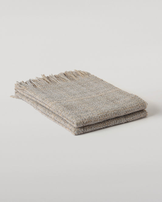 Johnstons of Elgin Luxury textured Throw in Natural, 82% Cashmere 10% Silk 8% Alpaca Johnstons of Elgin Luxury Texture Throw in Peat Brown and Navy, 82% Cashmere 10% Silk 8% Alpaca WB002930RU7812ONE