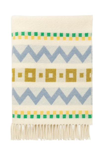 Folded Johnstons of Elgin Children's Zig Zag Blanket in shades of blue, green, and cream on white background WB002334RU7276ONE