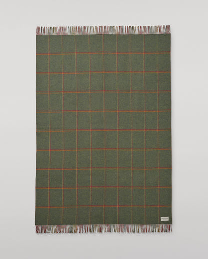 Johnstons of Elgin Interiors Collection Red Tweed & Green Windowpane Reversible Lambswool Throw on a grey background  WD000021XU0036N/A
