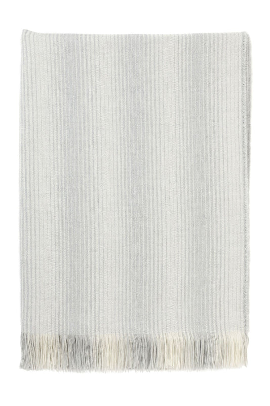 Johnstons of Elgin’s Silver & White Ombre Stripe Merino Throw on white background WD000257RU6990ONE