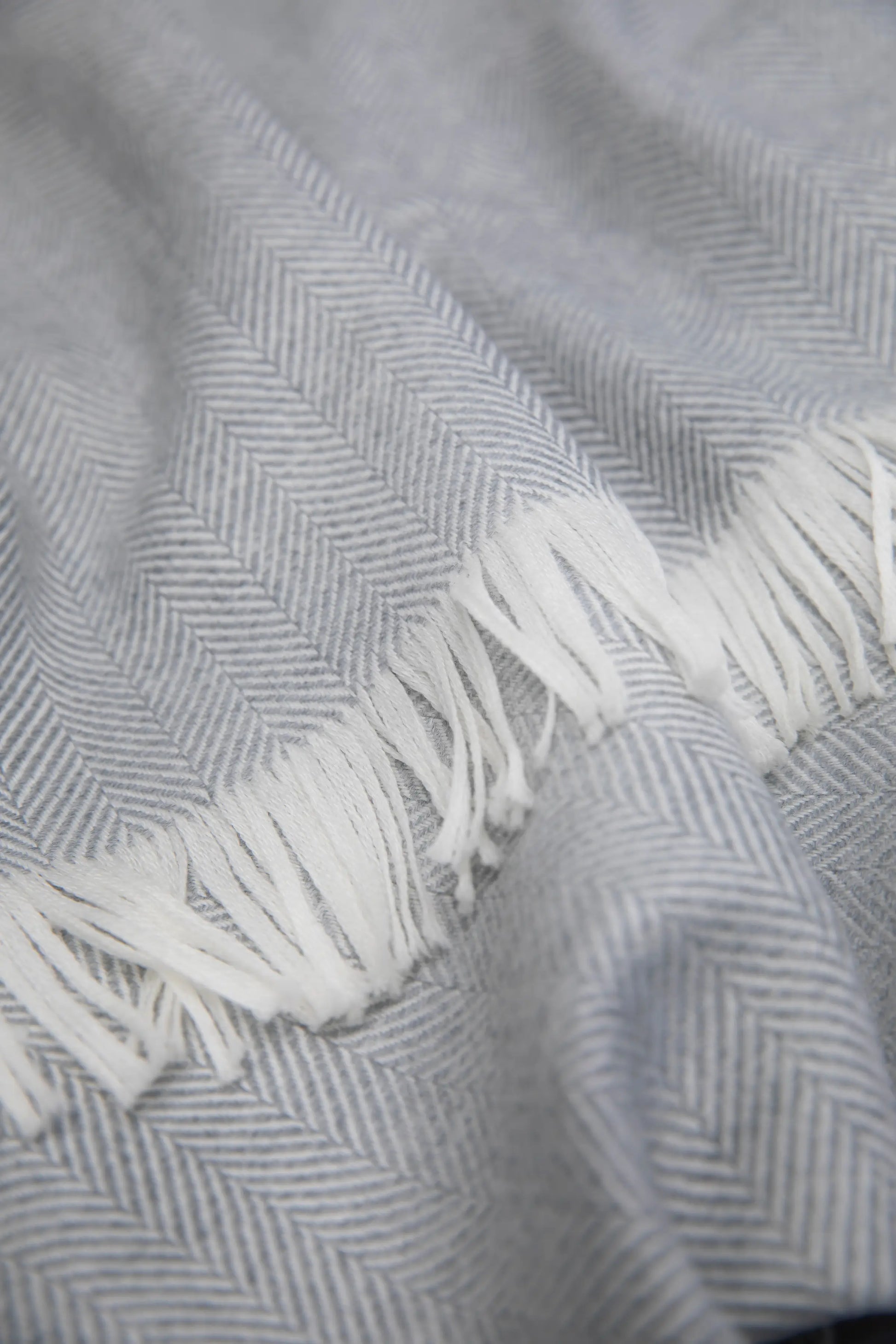 2025 Johnstons of Elgin Interiors Collection Mist & White Herringbone Merino Bed Throw detail   WD001115RU5857ONE