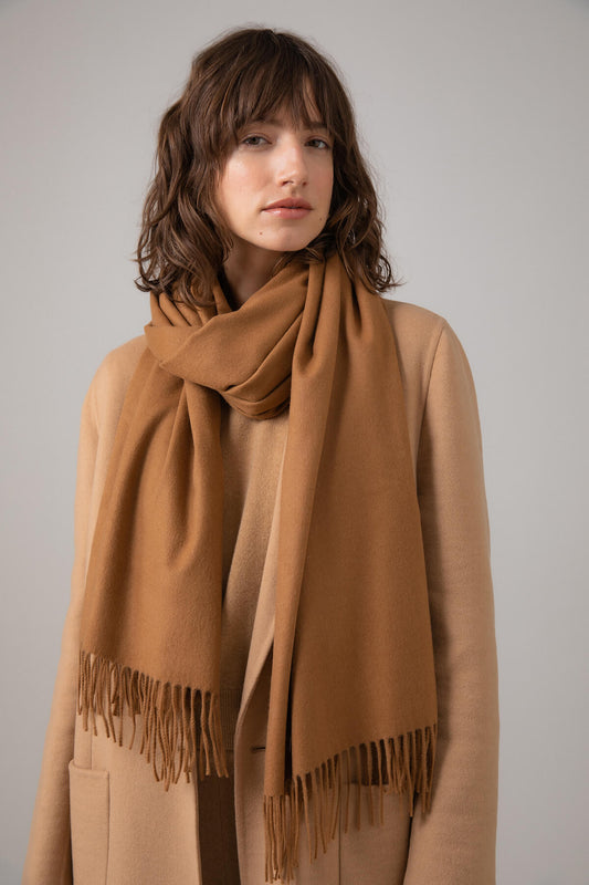 Model wearing Johnstons of Elgin Pure Vicuña Stole on a grey background WR000024SB3022N/A