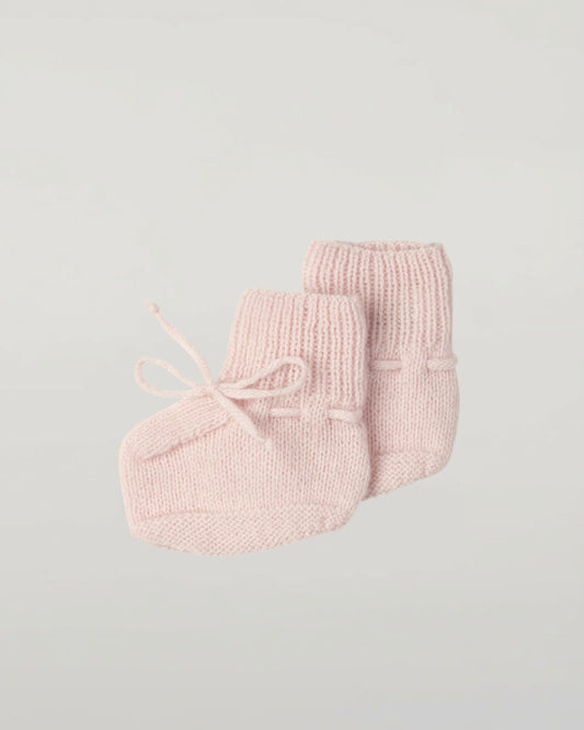 Johnstons of Elgin Hand Knitted Cashmere Baby Booties in Blush on white background JA000114SE0208ONE