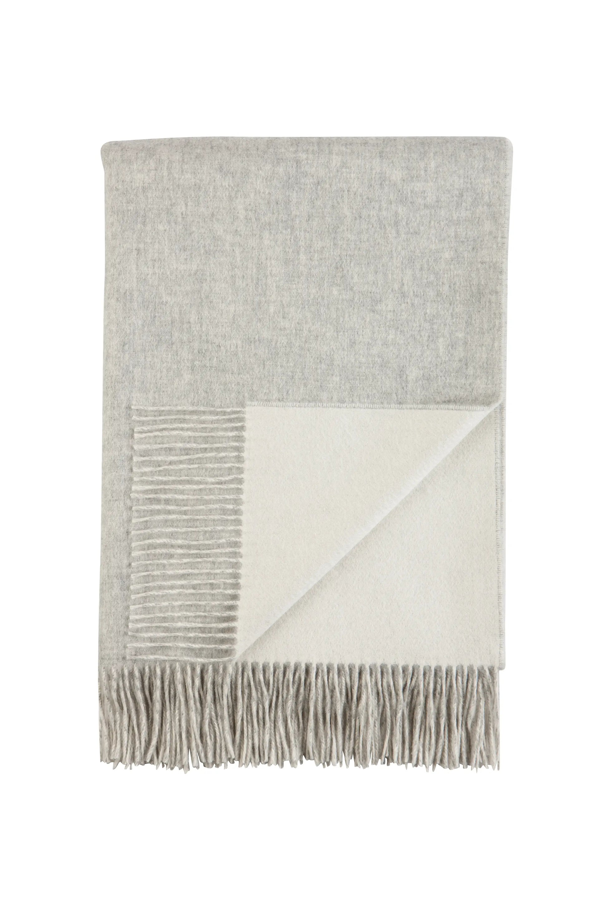 2025 Johnstons of Elgin Interiors Collection Silver & White Reversible Cashmere Bed Throw on a white background  WA001374RU6322ONE