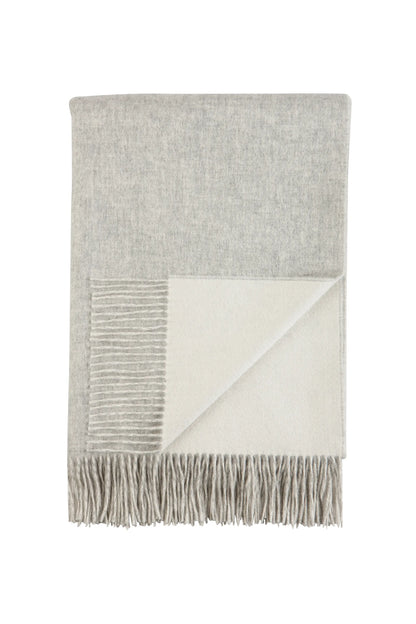 2025 Johnstons of Elgin Interiors Collection Silver & White Reversible Cashmere Bed Throw on a white background  WA001374RU6322ONE