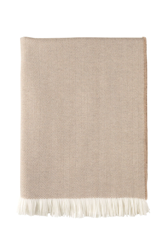 Johnstons of Elgin's Almond & White Herringbone Merino Throw on a white background WD000010RU5832ONE